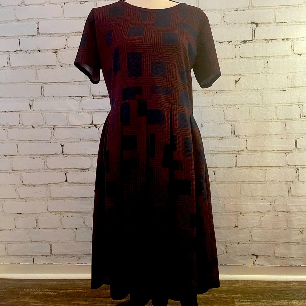 Plaid dress, perfect with a pair of your fave boots!